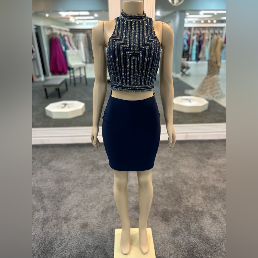 size 4. Navy color. Two piece fitted dress high neck top. Fully rhinestone out.